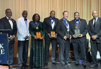 Tampa Y congratulates Keith Whitehead (second from right) on being honored!