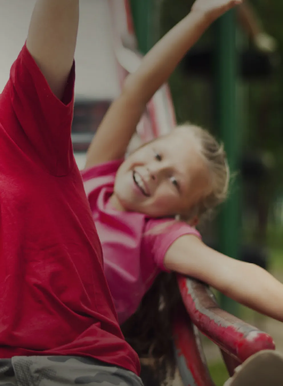 Kids sliding down slide