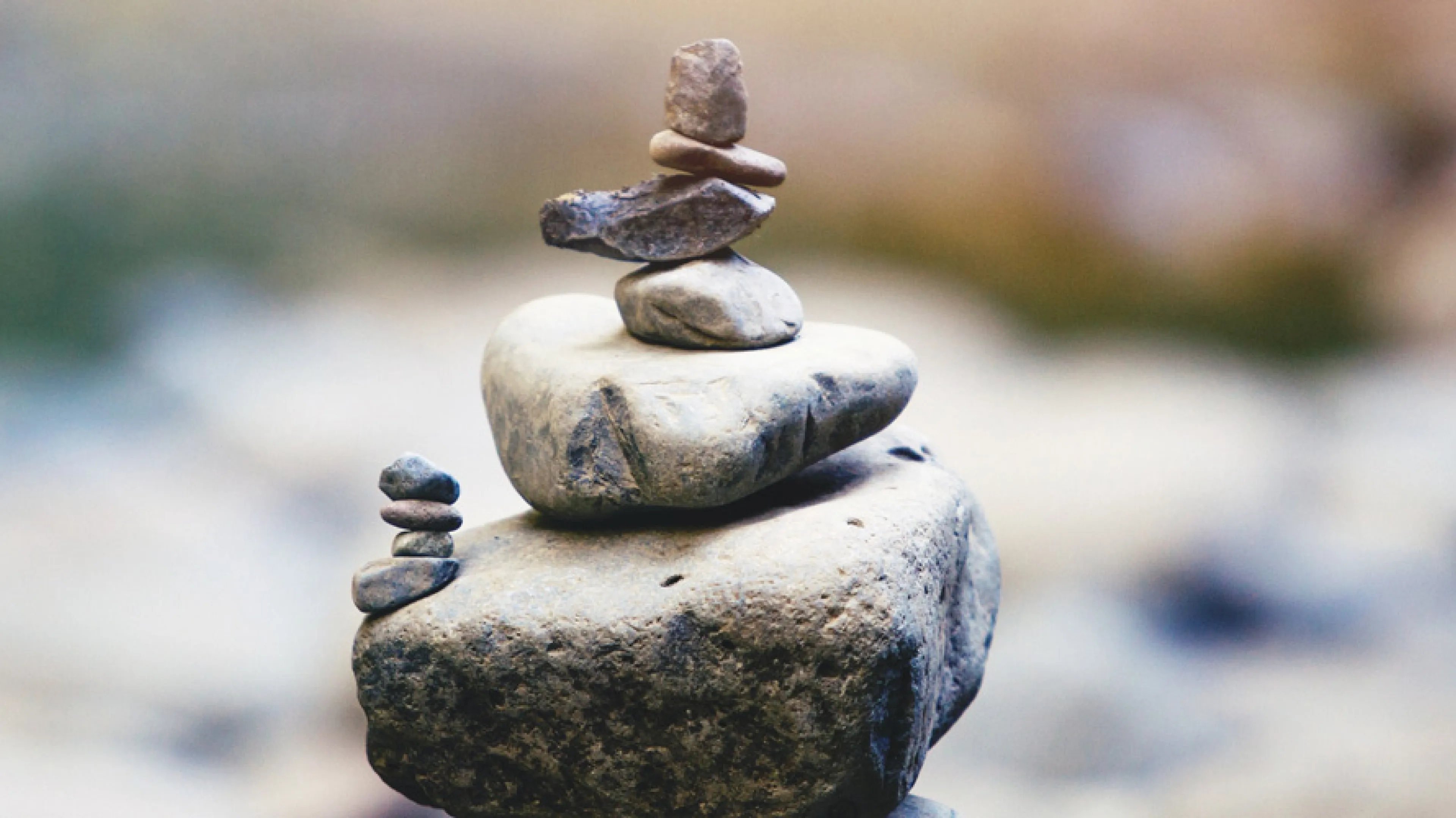 close up image of stacked stones with background out of focus