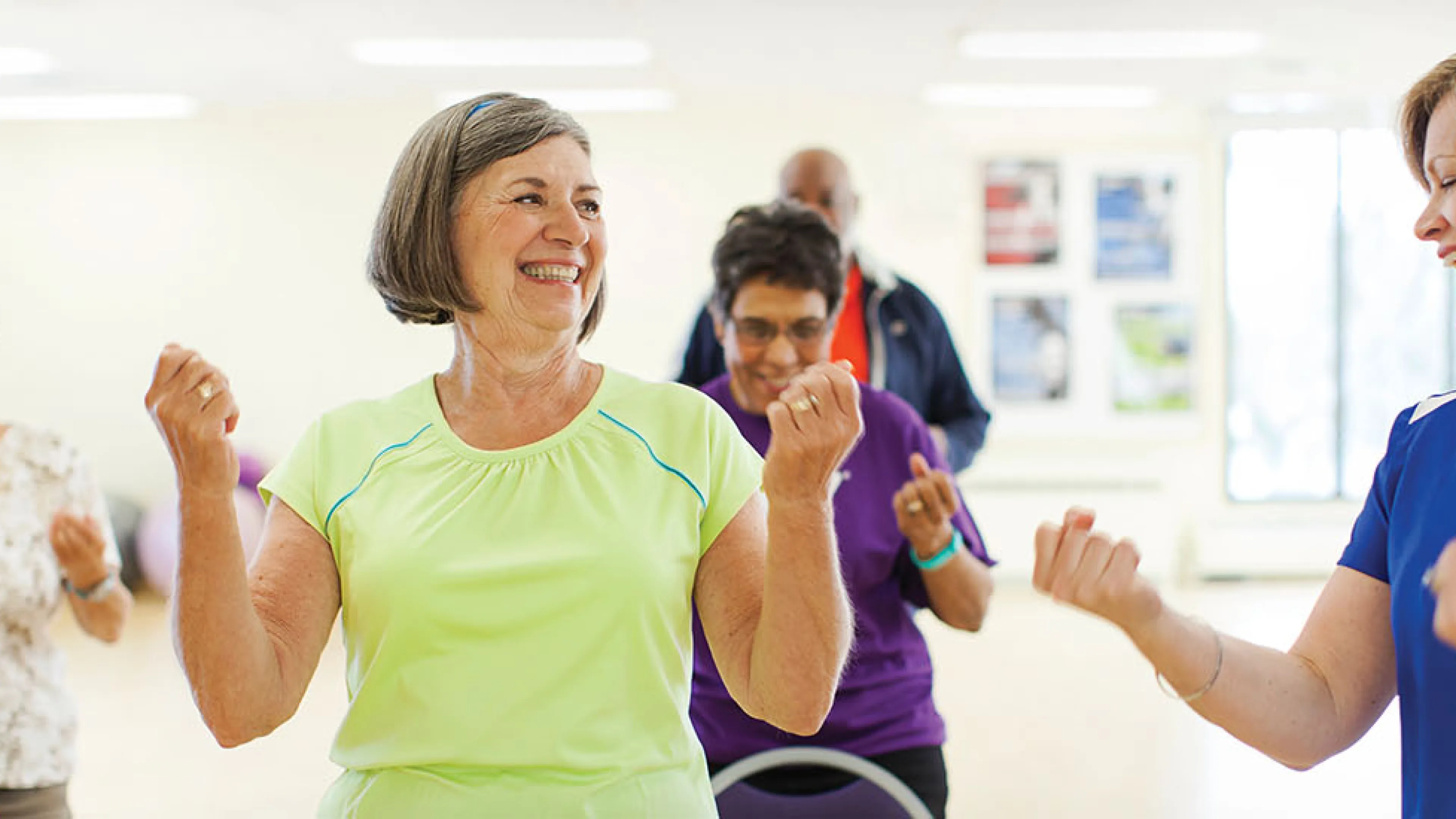 Active Older Adults in a chair exercise class at the YMCA.