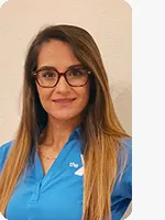 headshot of female personal trainer wearing blue YMCA polo beige background