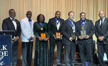 Tampa Y congratulates Keith Whitehead (second from right) on being honored!